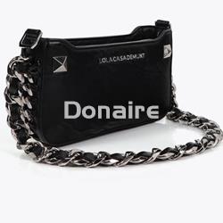 Bolsito efecto piel arrugada y tachas metálicas - Imagen 2