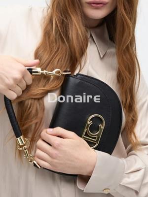 Bolso bandolera media luna con solapa Lola Casademunt - Imagen 1