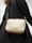 Bolso bandolera monograma dorado Lola Casademunt - Imagen 1