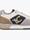 Zapatilla deportiva con suela personalizada y animal print Lola Casademunt - Imagen 1