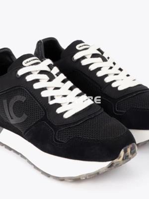 Zapatilla deportiva negra Lola Casademunt - Imagen 1